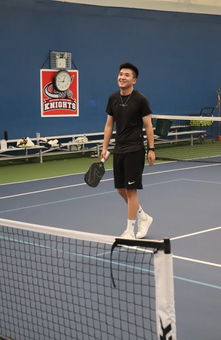 Kelvin mid-game on an indoor court